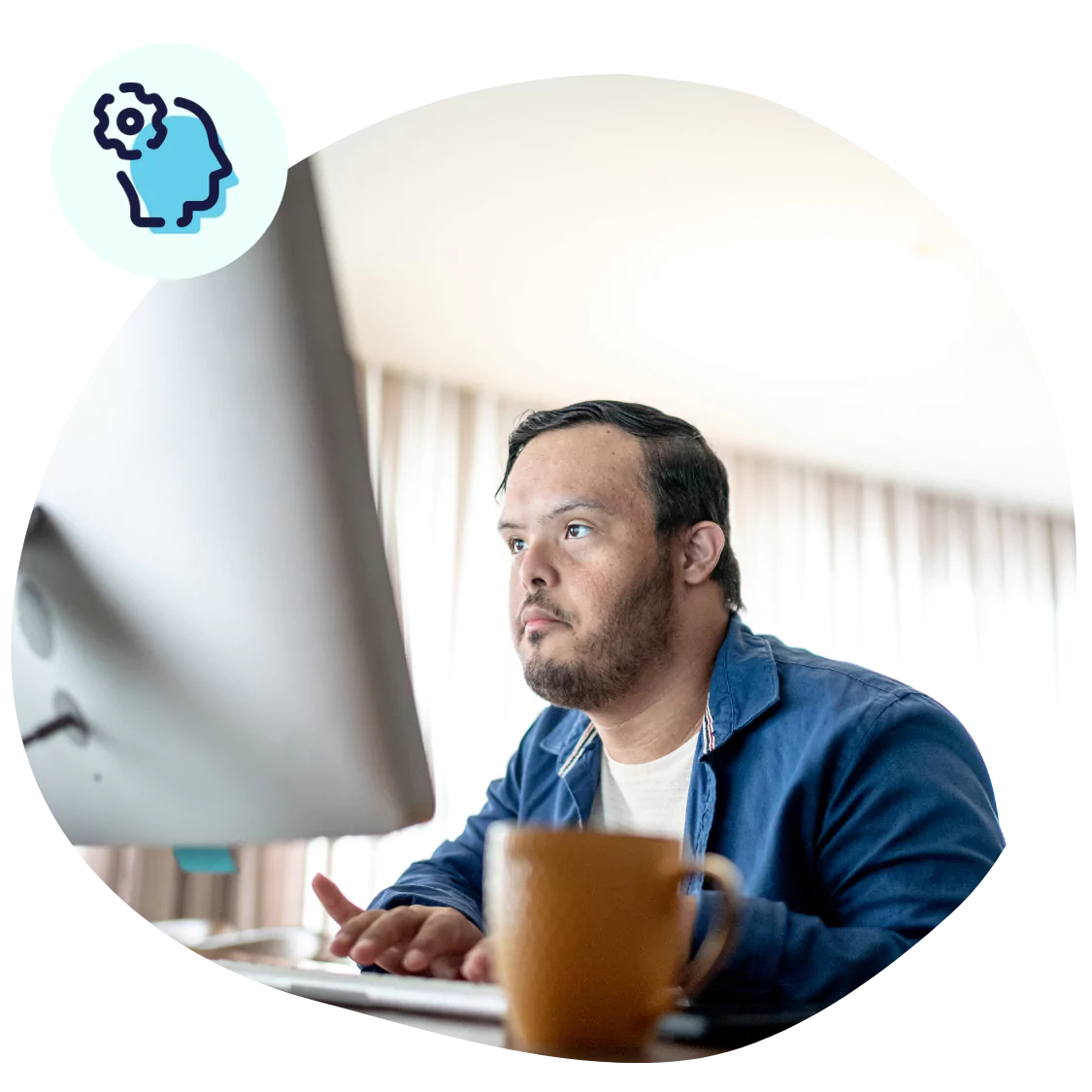 A man looking at his computer