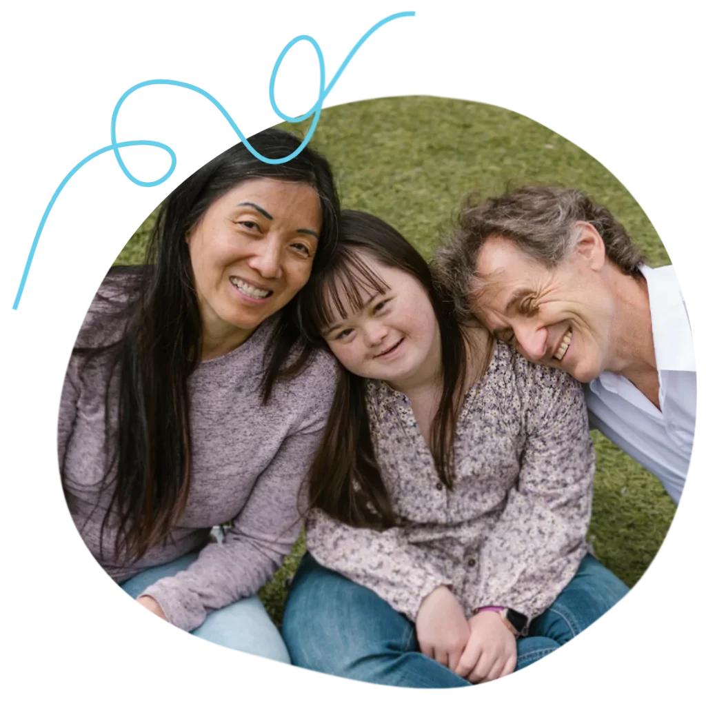 A disabled woman and her support workers